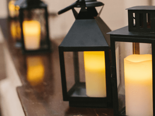 Softly lit lanterns creating a warm atmosphere inside Revolutionary Spaces Boston.