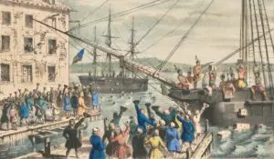 A historical illustration of the Boston Tea Party showing people throwing tea crates from a ship into the water.