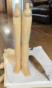 Polly’s legs during carving, with visible lines marking her boots, December 2022. Photo courtesy of Janet Cordell.