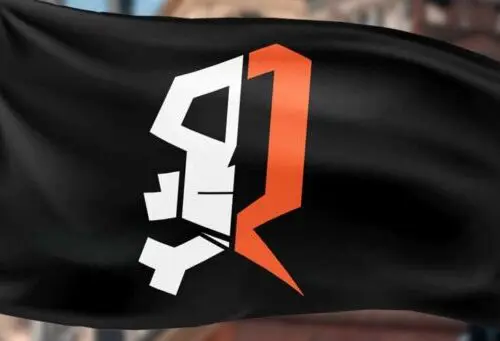 Black flag with emblem consisting of part of the orange R Revolutionary Spaces logo adjacent to half of a stylized white skull with buildings in the background