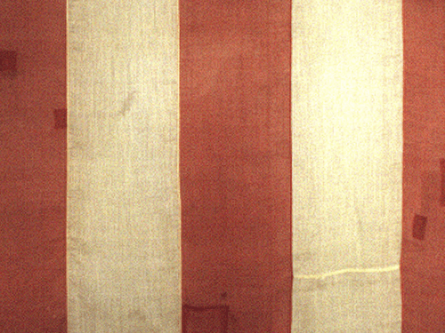 Wide flag with vertical red and ivory stripes of equal width